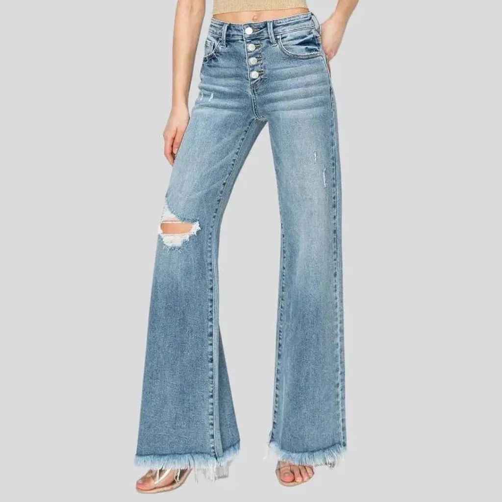 Buttoned sanded jeans
 for women