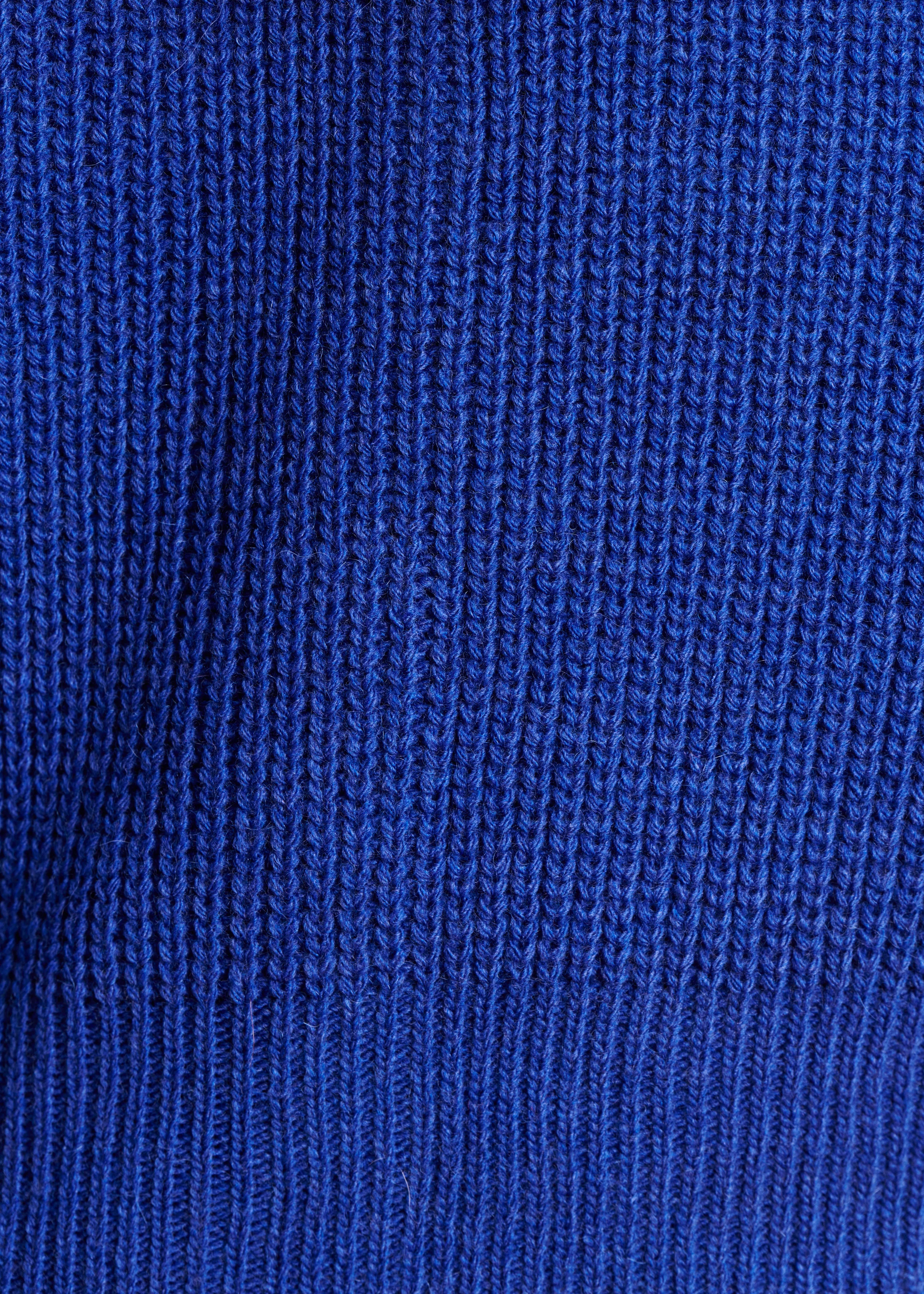 Gilet court bleu en maille côtes perlées